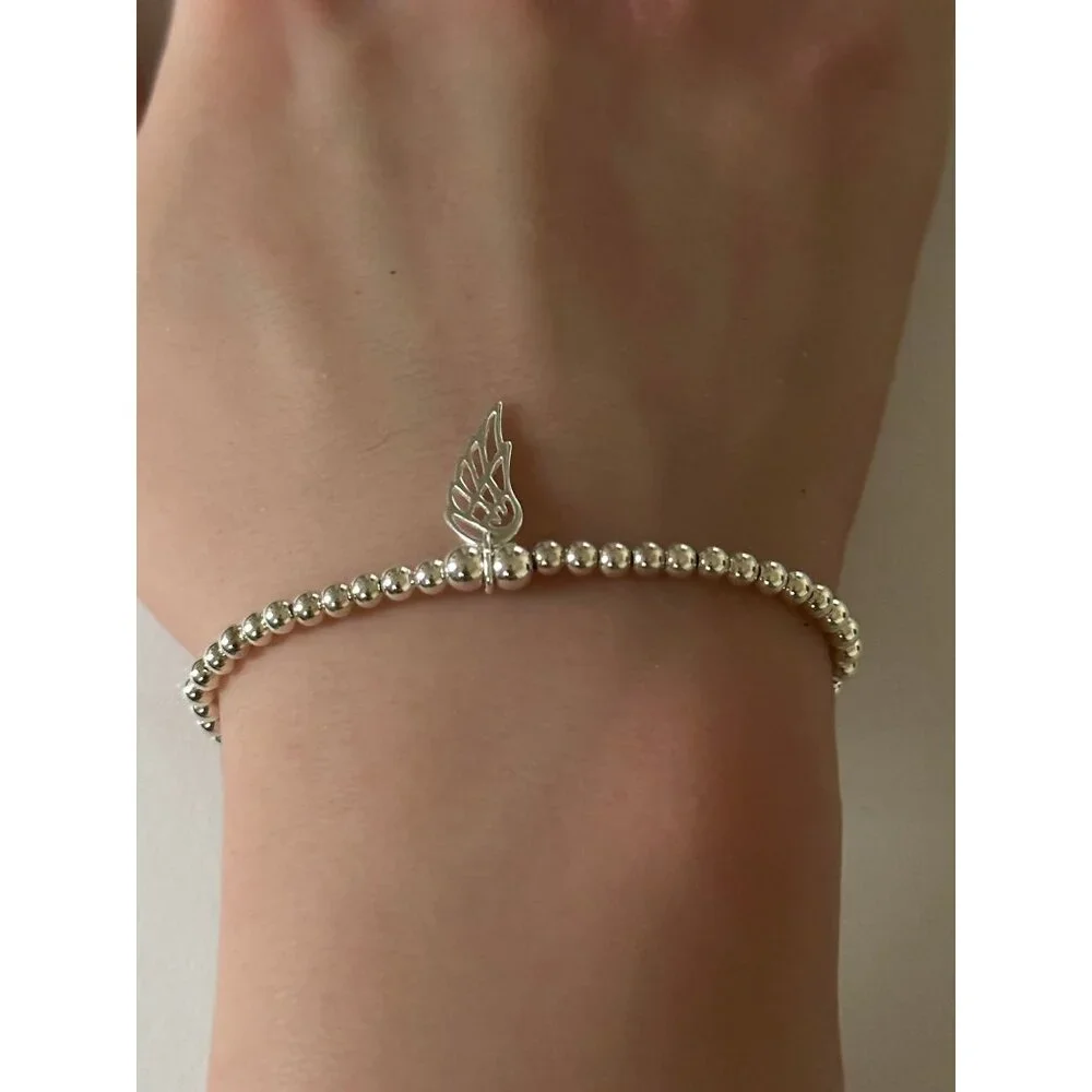 925 Sterling Silver Beaded Stretch Stacking Bracelet Wing Charm Minimalist S7" - Picture 3 of 6